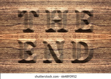 The End, Sign On A Rustic Wooden Board, Embossed Letters, 3D Illustration.