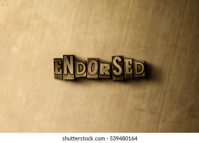 ENDORSED - close-up of grungy vintage typeset word on metal backdrop. Royalty free stock - 3D rendered stock image.  Can be used for online banner ads and direct mail.