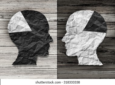 Ethnic Equality Concept And Racial Justice Symbol As A Black And White Crumpled Paper Shaped As A Human Head On Old Rustic Wood Background With Contrasting Tones As A Metaphor For Social Race Issues.