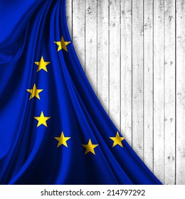 Europe Union Flag Fabric And Wood Background