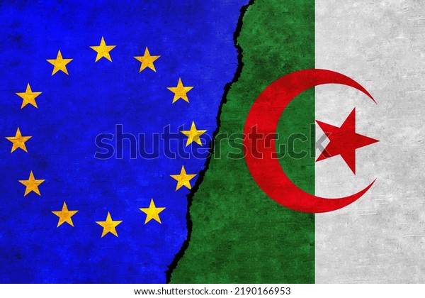 European Union and Algeria flags on a wall with a\
crack. Algeria and European Union flags together. EU Algeria\
alliance, politics, economy, trade, relationship and conflicts\
concept