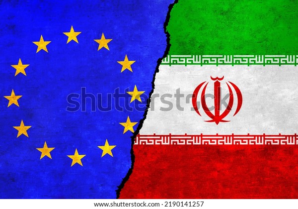 European Union and\
Iran flags on a wall with a crack. Iran and European Union flags\
together. EU Iran alliance, politics, economy, trade, relationship\
and conflicts\
concept