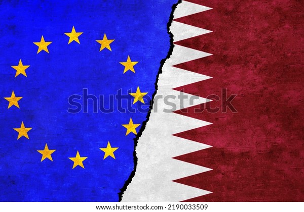 European Union and\
Qatar flags on a wall with a crack. Qatar and European Union flags\
together. EU Qatar alliance, politics, economy, trade, relationship\
and conflicts\
concept