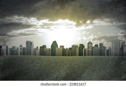 Evening city. Buildings and green grass field. Grunge style - Shutterstock ID 223811617