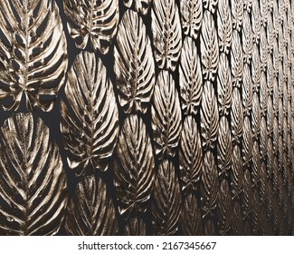 An Exotic Offset Pattern Created By Gold Delicious Monster Monstera Leaves On A Dark Background - 3D Render