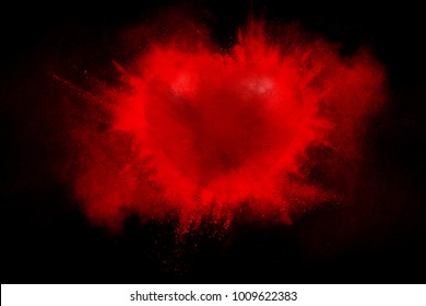 Exploding Red Heart On A Black Background