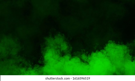 Explosion green fog on isolated black background. Experiment chemistry smoke. The concept of aromatherapy.