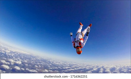 Extreme sports catapult parachutist. The sky is a working environment for a skydiver.Sports adrenaline hobbies marketing. Beautiful views from the height of bird flight.