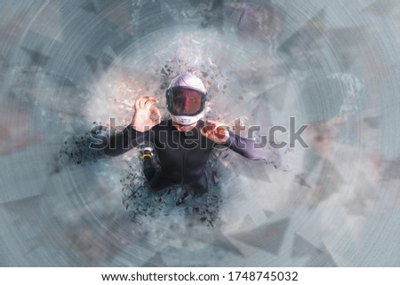 Similar – A woman disposes of red bin liners in the residual waste garbage can