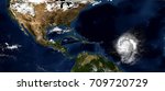Extremely detailed and realistic high resolution 3D illustration of a hurricane approaching the eastern Carribbean islands. Shot from space. Elements of this image are furnished by Nasa.