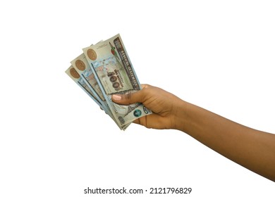 Fair hand holding 3D rendered Guatemalan quetzal notes isolated on white background