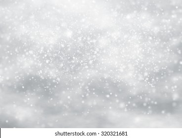 Falling Snow On The Blue Background