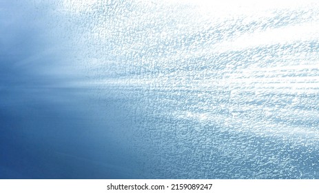 Fantasy digital graphic abstract backdrop of moving light and dust blue beige gradient. For Wallpapers, Games, Websites, Banners, Ads, Products, Books, World
