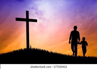 father and son praying under the cross