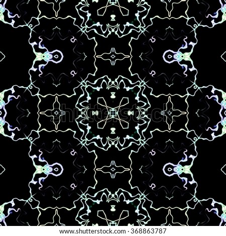 Faultless abstract ornament. Seamless pattern or textures. Kaleidoscopic orient popular style in soften colors.