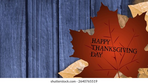 Featuring large brownish-red maple leaf bearing HAPPY THANKSGIVING DAY on blue planks, copy space. Autumn, fall, foliage, rustic, seasonal, celebration, decoration - Powered by Shutterstock - Get 15% off with code: PIKWIZARD15