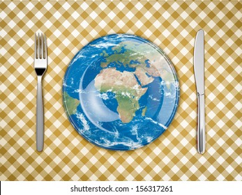 feed the world plate fork and knife Elements of this image furnished by NASA
