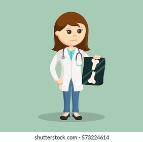 Female Doctor Holding Broken Bone X-ray