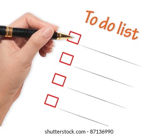 female hand checking to do list
