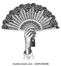 Female hand with open fan. Vintage engraving stylized drawing