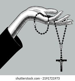 Female hand and prayer