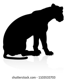 A Female Lion Or Other Big Cat Safari Animal In Silhouette