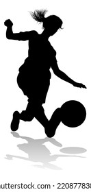 A Female Soccer Football Player Woman In Silhouettes