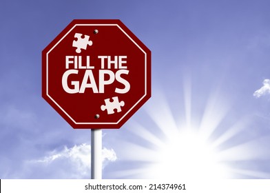 Fill the Gaps red sign with sun background 