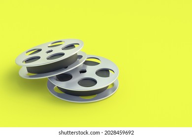 Film Reel In Metal Frame On Yellow Background. Cinematography Tape. Retro Technology. Cinema Premiere. Documentary Shooting. Copy Space. 3d Render