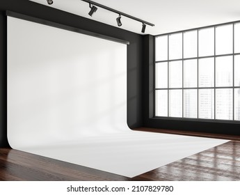 Film, Video And Photo Studio Interior With Panoramic Window On City View, Large Cyclorama And Spotlights, Side View, Dark Parquet Floor. Copy Space Empty Canvas, 3D Rendering