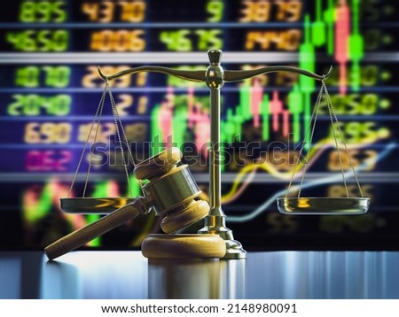 Financial law concept with 3d rendering law scale and gavel judge on stock market exchange board