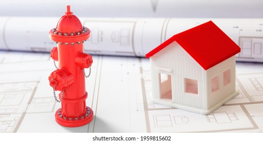 Fire Hydrant Red Color And A House Model On Blueprints Drawings Background. City Utilities Design, Firefighting System, Fire Protection Engineering Concept. 3d, Illustration,