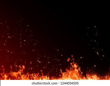 Fire particles debris isolated on black background for text or space . Film effect.