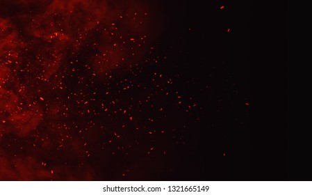 Fire particles debris isolated on black background for text or space . Film texture effect.