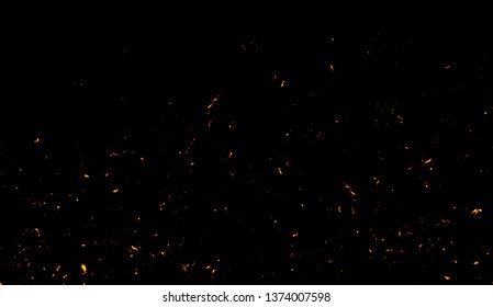 Fire particles effect dust debris isolated on black background, motion powder spray burst.