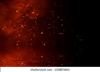 Fire Particles Embers With Reflection In Water. Design Texture For Banner,flyer,card And Poster .