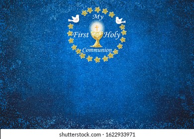 First holy communion invitation card.Golden chalice and doves with text " My first holy communion"on blue paper background with copy space to text and photo.