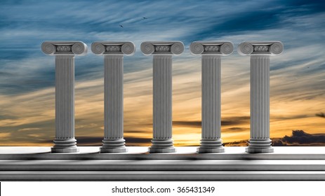 Five Ancient Pillars With Sunset Sky Background.