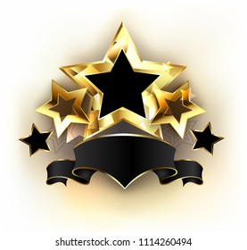 Five Gold Stars With  Black Velvet Ribbon On White Background.