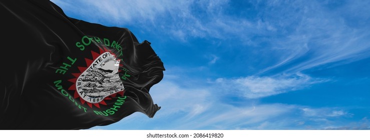 Flag Of African Americans Of South Dakota State, Untied States Of America At Cloudy Sky Background On Sunset, Panoramic View. Copy Space For Wide Banner. 3d Illustration