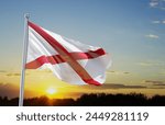 Flag of Alabama US state against the sunset. 3d-rendering