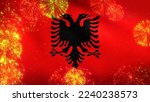Flag of Albania surrounded with fireworks. New Year party or other holiday celebration concept.