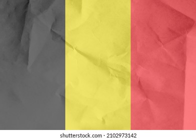 Flag Of Belgium Waving In The Wind. The State Symbol Of The Kingdom Of Belgium. National Sign Of The Belgian People