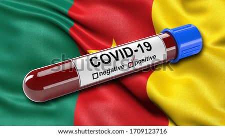 Flag of Cameroon waving in the wind with a positive Covid-19 blood test tube. 3D illustration concept for blood testing for diagnosis of the new Corona virus.