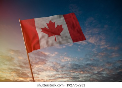 Flag of Canada flying in the wind with flag pole, cloudy day, 3D rendering