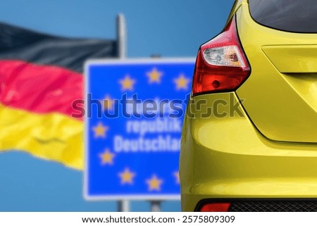 The flag of Germany and a modern car