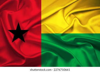 Flag of Guinea-Bissau, 3D illustration of Guinea-Bissau flag blowing in the wind, Flag of Guinea-Bissau on silk fabric in the wind, Windy textile Guinea-Bissau flag. 3D illustration and background. - Powered by Shutterstock