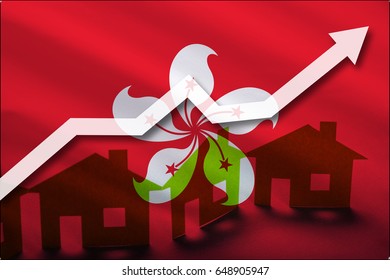 The Flag Of Hong Kong And The Rising Prices Of Real Estate. Rental Prices Are Rising Up In The Tourist Season. Home And White Arrow Up On A Flag Background.