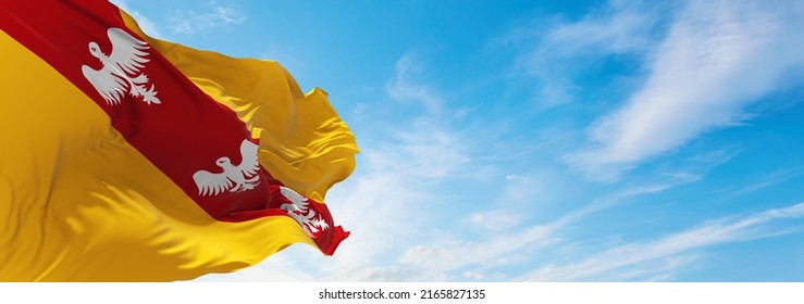 flag of  Lorraine, France at cloudy sky background on sunset, panoramic view. French travel and patriot concept. copy space for wide banner. 3d illustration