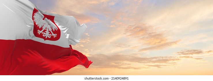 flag of Naval Ensign  , Poland at cloudy sky background on sunset, panoramic view. Polish travel and patriot concept. copy space for wide banner. 3d illustration